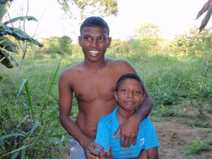 Boys stop working to pose for Paul