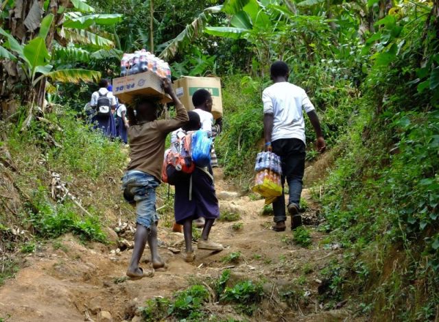 We met these children on the trail. Look at the loads they are carrying!
