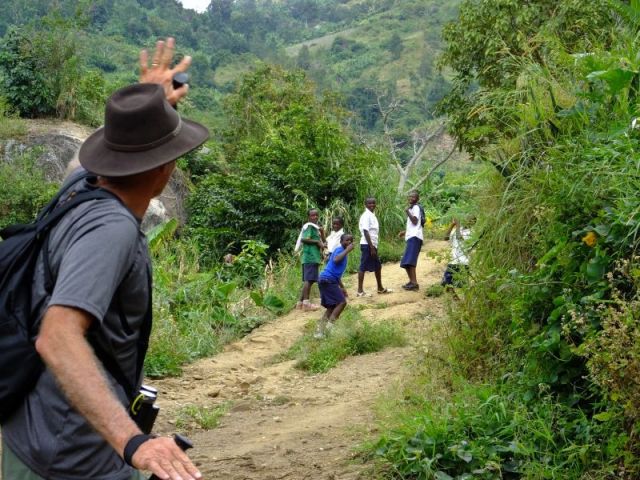 Paul waving goodbye to these children he made laugh when he joined in their dancing.