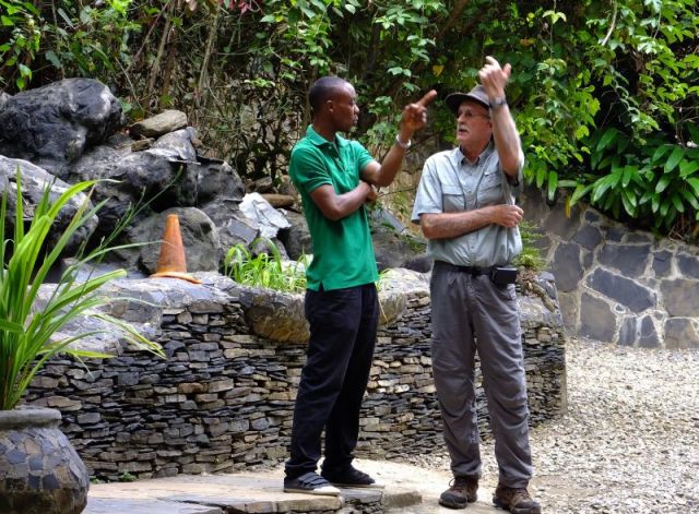 Paul in conversation with a staff member