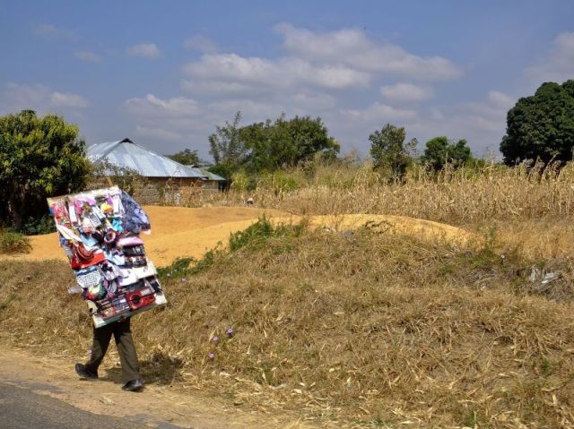The peddler, what a variety of merchandise he has.