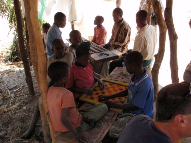 Playing checkers and bao Paul's photo