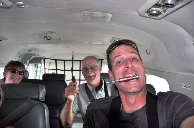 O.K. maybe this is the real reason they made us sit in the back! Obviously screening is not part of flying in country:). Brian actually posed and took this photo.