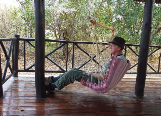 Paul relaxing on our porch
