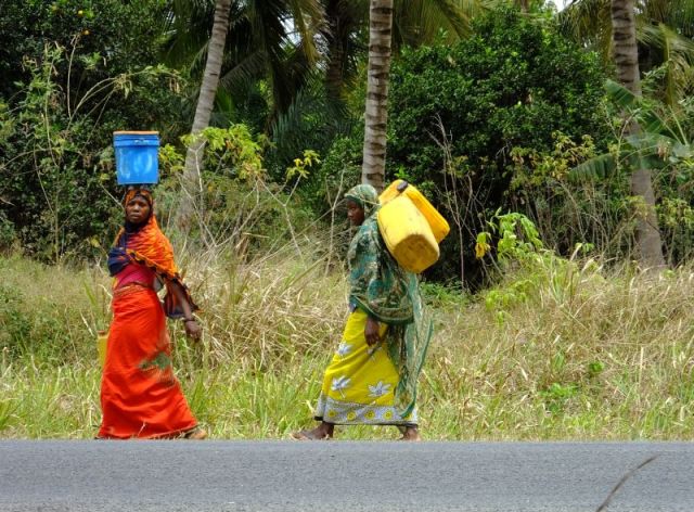 Two women that passed us as we were having our last boxed lunch in Africa