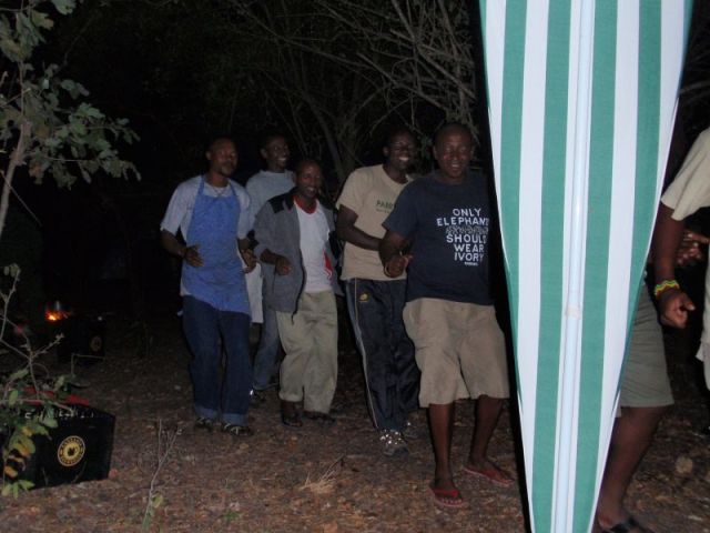 The men singing and dancing on our last night in camp. Paul's photo
