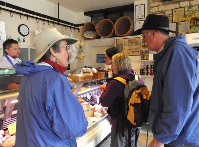 Buying cheese at the butcher shop