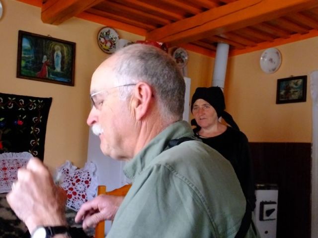 Our hostess intently observing Paul as he drinks the horinca.