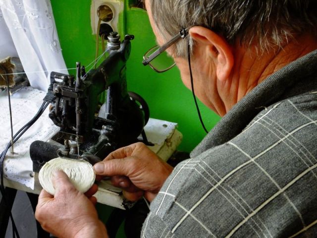 Vasile making a traditional men's hat