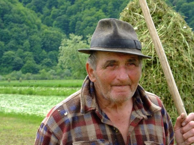 Working in the hay field didn't stop this man from being a gentleman!