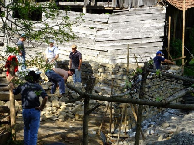 Paul watching the wall building crew
