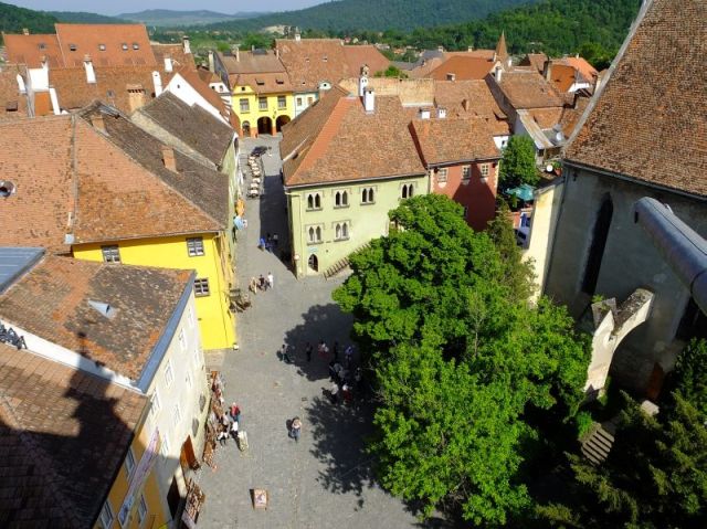 Looking down at the street where the people looked like miniature figures