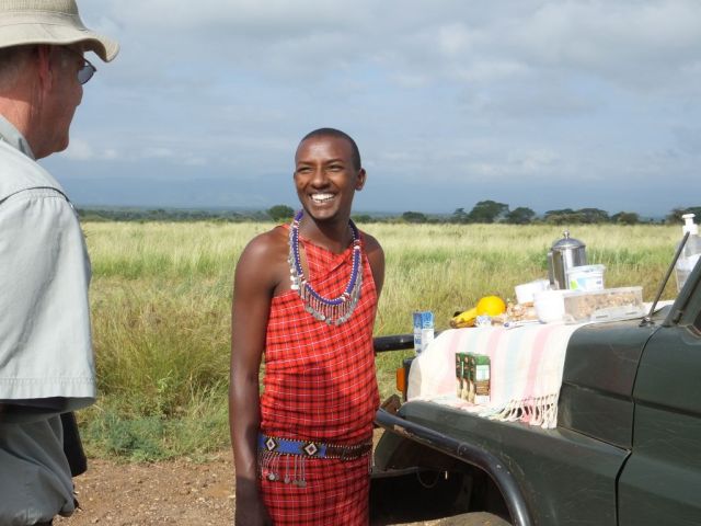 Dominic our wonderful guide and our breakfast laid out on the Cruisers' hood.