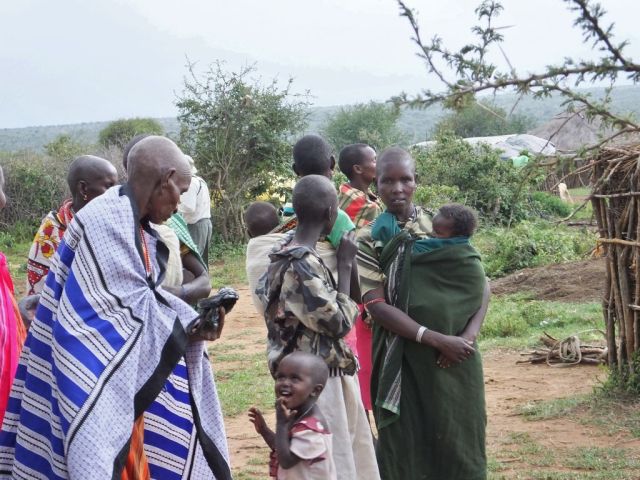 Some of the women that were gathered around the crafts