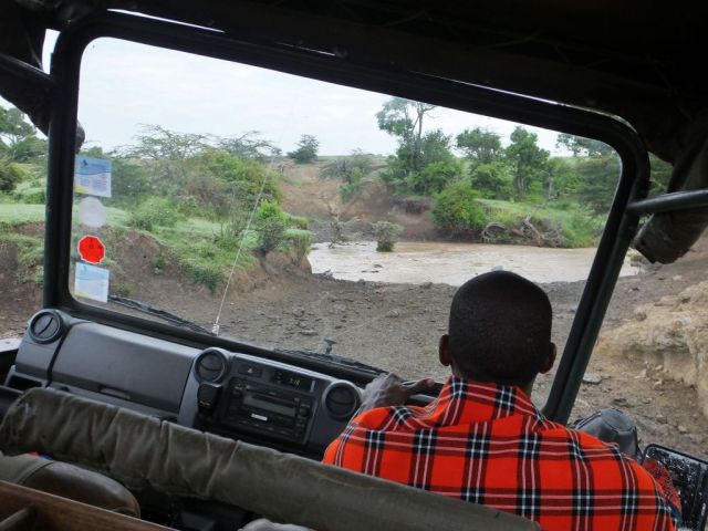 Yes the Cruiser is tilting heavily and we are going up that dirt cut on the other side