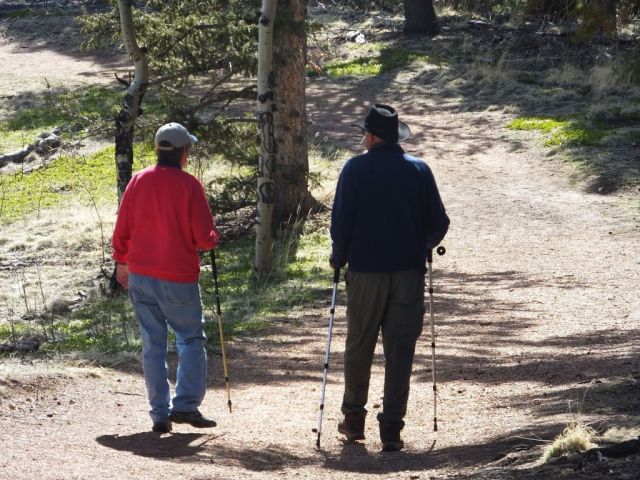 Brother and sister hiking in the state park.