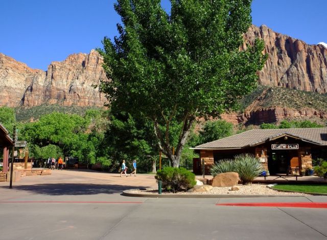 A photo with Zion Park sign and Brew Pub. Hilarious