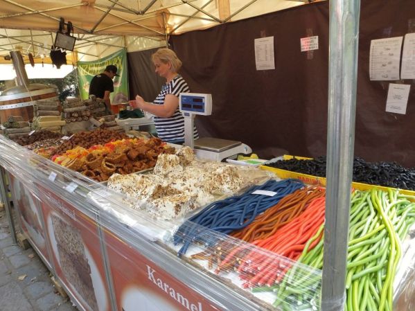 All kinds of candy for sale at this stand.