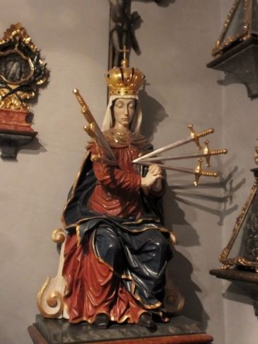 This was close by the St. Reparatus exhibit. I wonder what the 7 swords in Mary's(?) breast symbolize? Anyone?