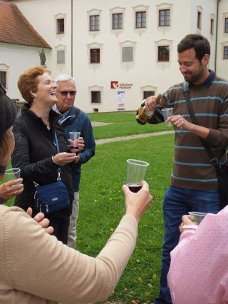 Milan pouring mead for everyone