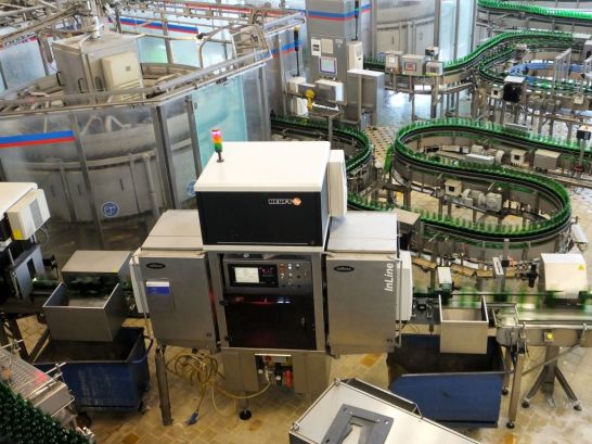 This machine was one that detected flaws in the recycled bottles.