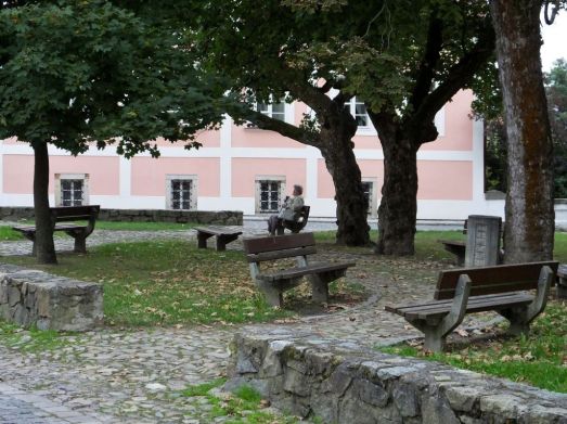 A woman enjoying this small park we walked by.