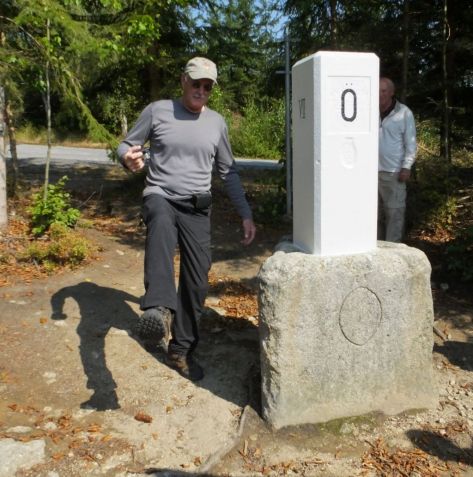 Paul stepping over the Czech border into Austria