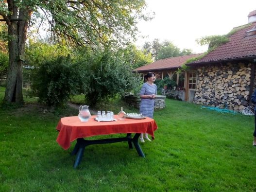 Welcoming us to their home with a drink of liquor made from their pear trees.