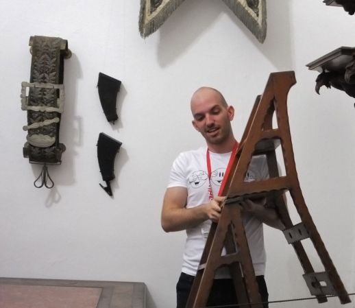 Our guide showing off a nifty chair that can be folded out to make a step ladder.