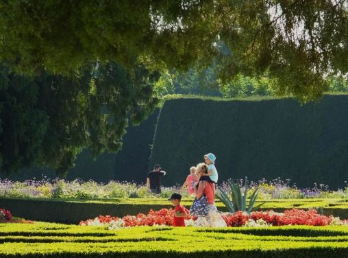 People enjoying the gorgeous garden in front of the Castle