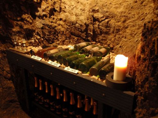 Wine bottles stored in the ancient cellar
