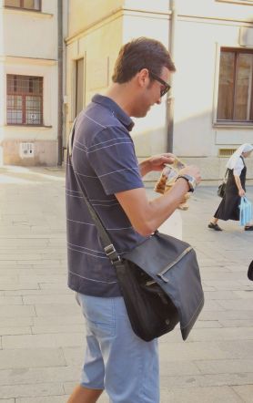 Milan preparing to hand out the pastry treats.