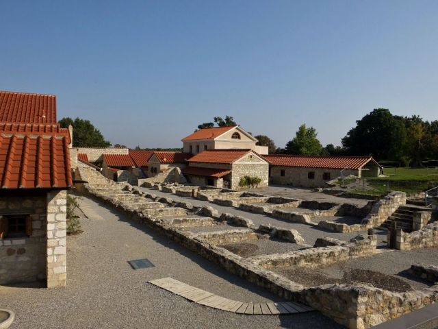 Restored buildings and the foundations of other buildings that they are unsure of what they were.