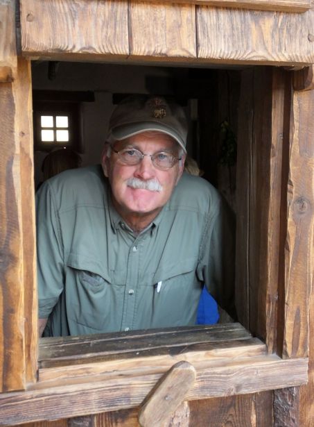 Paul looking out the kitchen window at Carnuntum