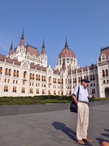 Our guide in front of the incredible Parliament