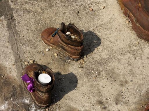 A child's pair of shoes. How can you not be touched by this?