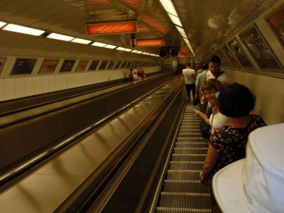 Taking the escalator down to the metro, Paul's photo